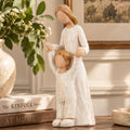 Mother and Child Figurine, Mom and Boy Holding Hands Walking Together by Unknown