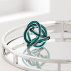 Torre & Tagus Orbit Hand Blown Glass Infinity Knot Sculpture - 3 Inch Glass Art Teal Knot Decor Ball for Home Decor, Small Centerpiece Table Decoration for Home Interior (Clear Teal) - Image 2