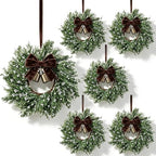 6 Pcs Small Christmas Hanging Wreaths Artificial Snow Flocked Cedar Wreaths with Brown Velvet Ribbon & Bronze Bells Mini Christmas Wreaths for Cabinet Porch Front Door Winter Xmas Holiday Decorations by Unknown