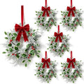 6 Pack Mini Christmas Hanging Wreaths Small Artificial Frosted Pine Cedar Wreaths with Red Berries Variegated Holly Leaves Faux Snowy Evergreen Wreath for Cabinets Front Door Window Porch Xmas Holiday by Unknown