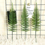 CATTREE Artificial Shrubs Leaves, Plastic Plants Fern Grass Leaf Fake Bushes Indoor Outdoor Garden Office Table Centerpieces Arrangements DIY Wreath Decoration Planter Filler - 10 Pack - Image 3